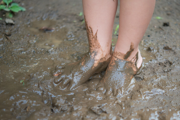 Muddy child's feet