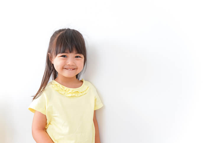 a cute asian girl smiling