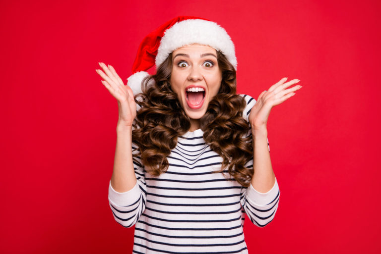 Merry holly x mas portrait of crazy cool cheerful glad positive optimistic charming curly-haired girl in casual striped pullover clapping palms