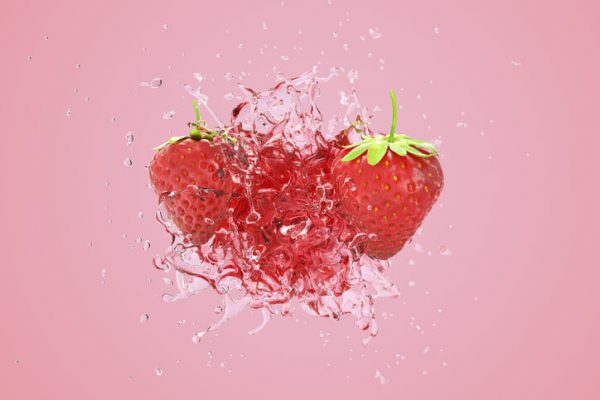 Explosion Strawberry juicy liquid with Strawberry fruit on pink background